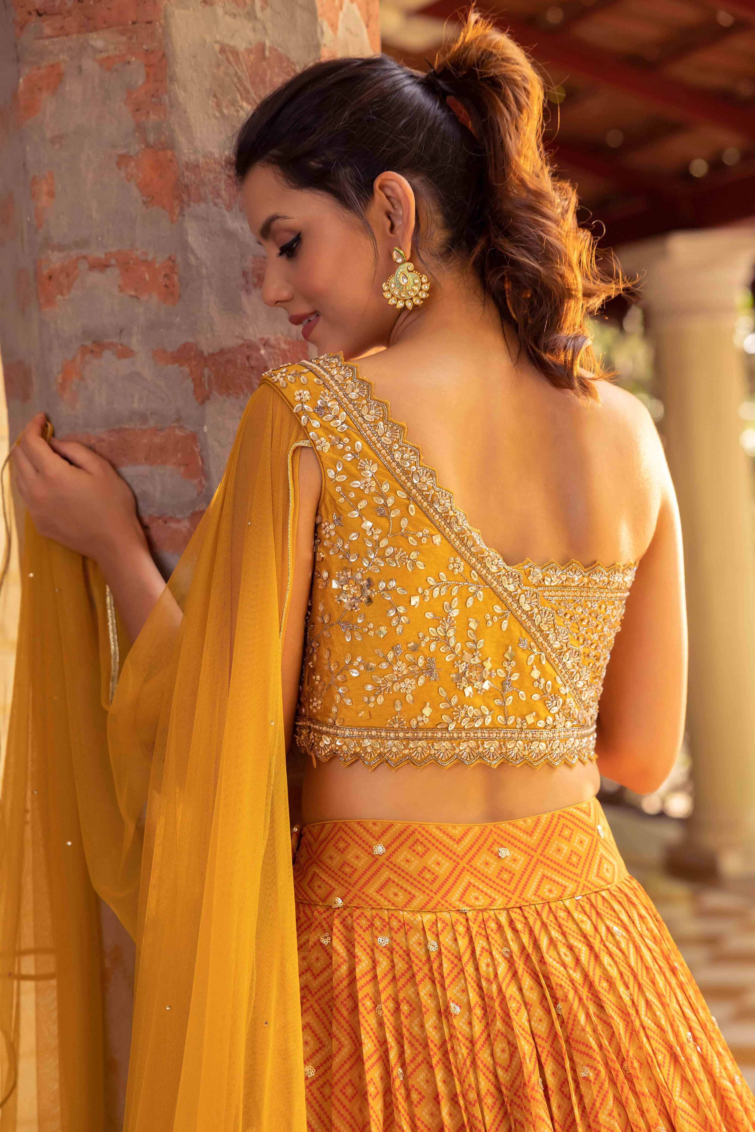 Brown Sequins Embroidered Netted Lehenga Choli